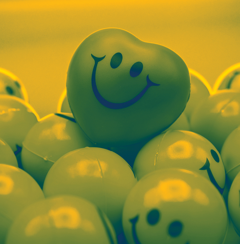 Heart shaped ball in a bunch of smiley stress balls, like MMO’s personal touch in expertise.